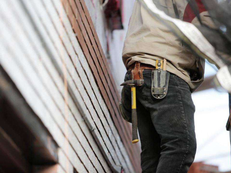 Tradesperson with a tool belt