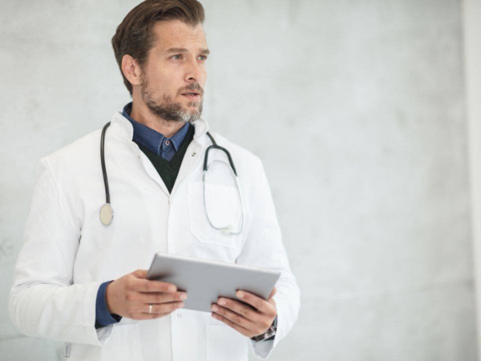 Doctor holding a tablet