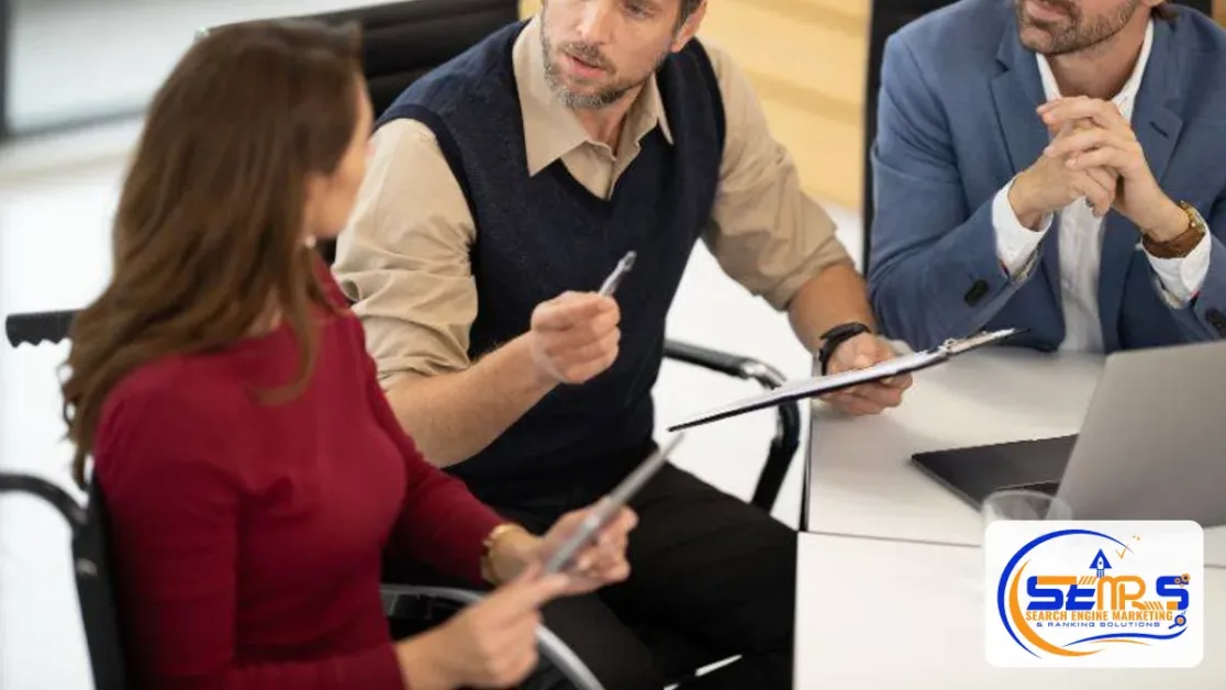 Financial Advisor Marketing: How to Get More Qualified Clients in 2026 1 Business advisors meeting around a laptop to review a client plan
